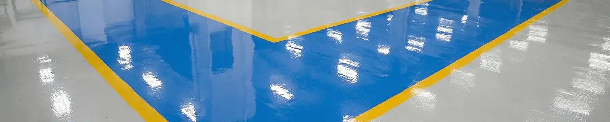 A factory floor professionally covered and marked with epoxy flooring in Fort Lauderdale, FL