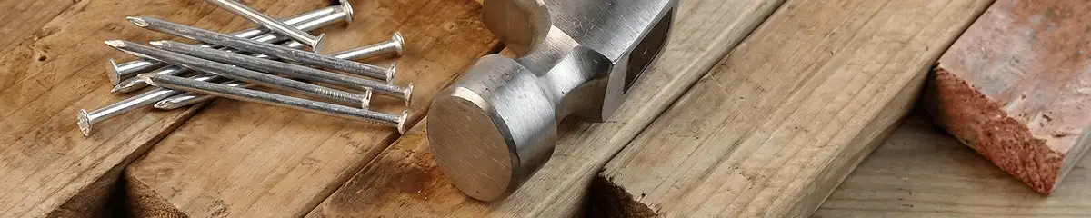 Hammer and nails on hardwood flooring boards in Fort Lauderdale, FL