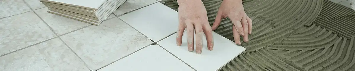 Professional installing white tile floors in Fort Lauderdale, FL