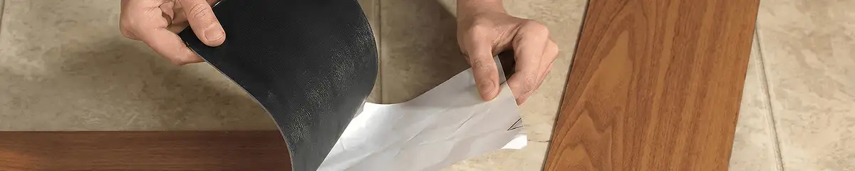 A professional installing vinyl flooring in Fort Lauderdale, FL