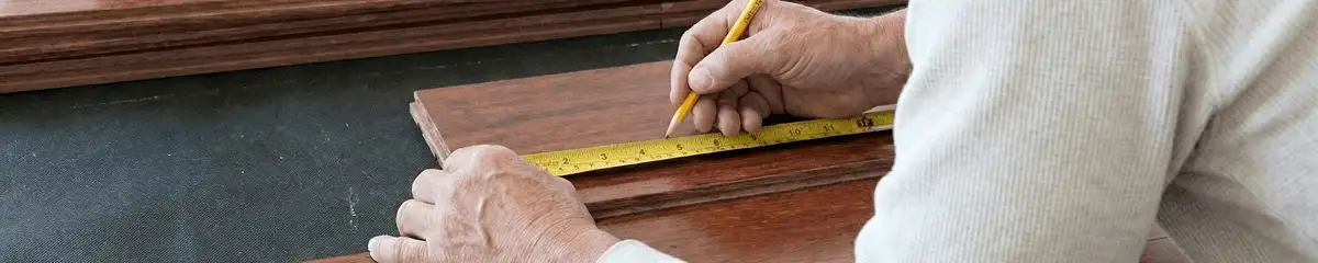 A professional installing wood flooring in Fort Lauderdale, FL